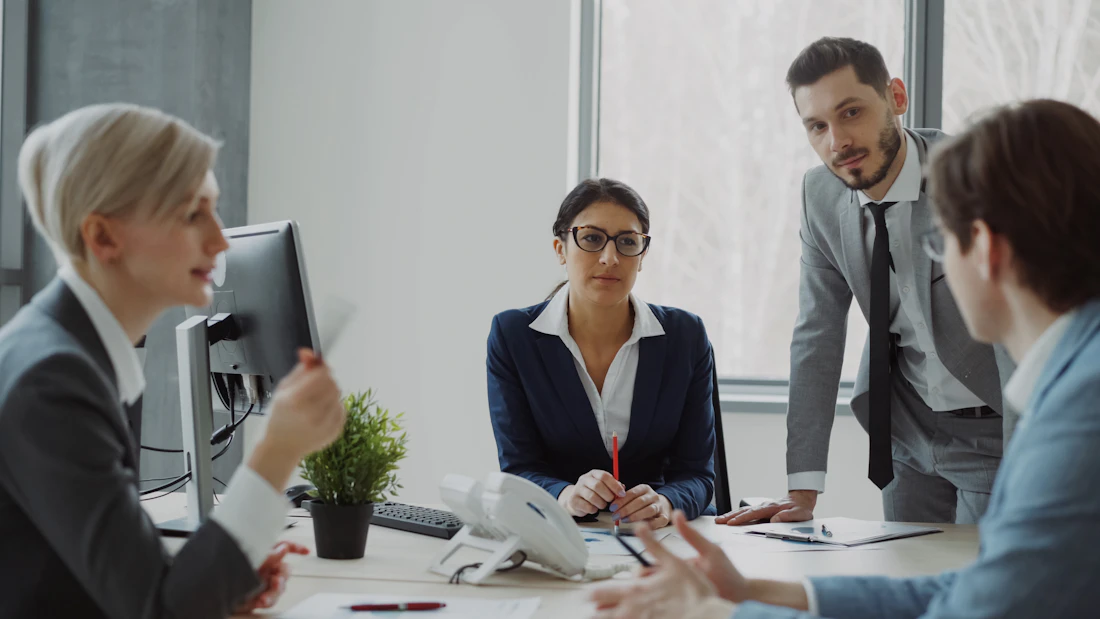 Executives collaborating in a corporate meeting